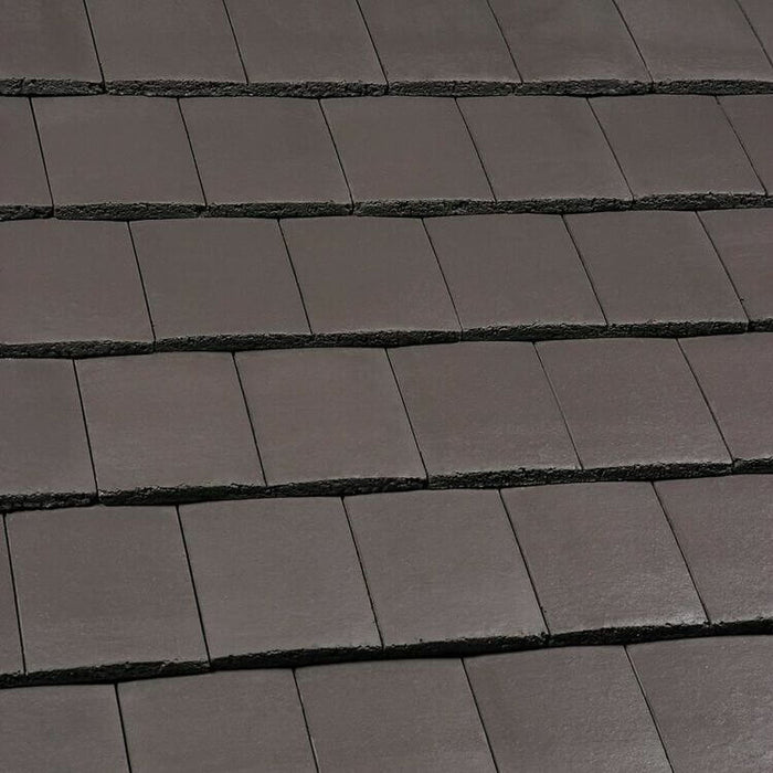 An image of Marley Ashmore Interlocking Tiles in Smooth Brown.