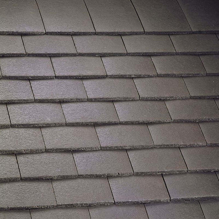 An image of Marley Concrete Plain Tiles in Smooth Brown.