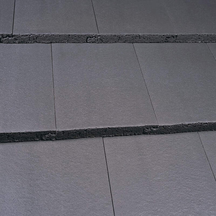 An image of a Marley Modern Interlocking Roof Tile Smooth Grey.