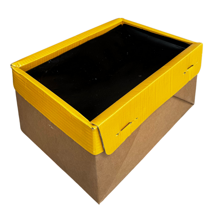 An image of a Plura Hot Melt Bitumen Block in a cardboard box with 20kg of contents