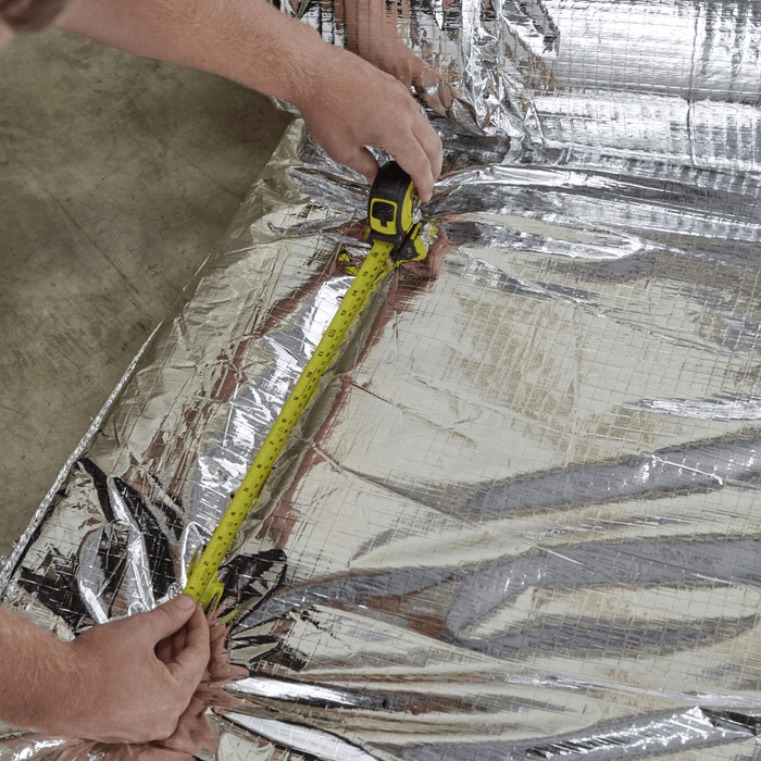 An image of ThermaQuilt Ultra being measure