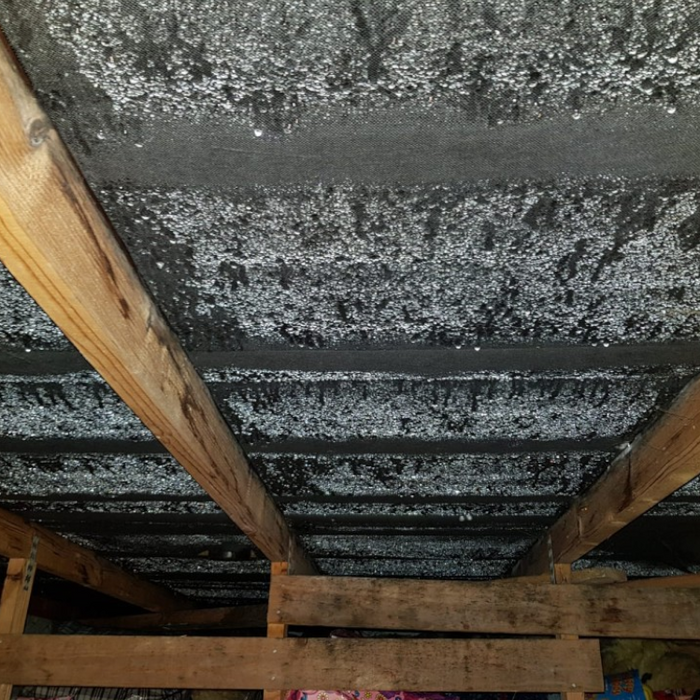 An image of condensation in a loft / attic / roof space