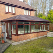 An image of a conservatory with Britmet Profile 49 Roof Shingles  