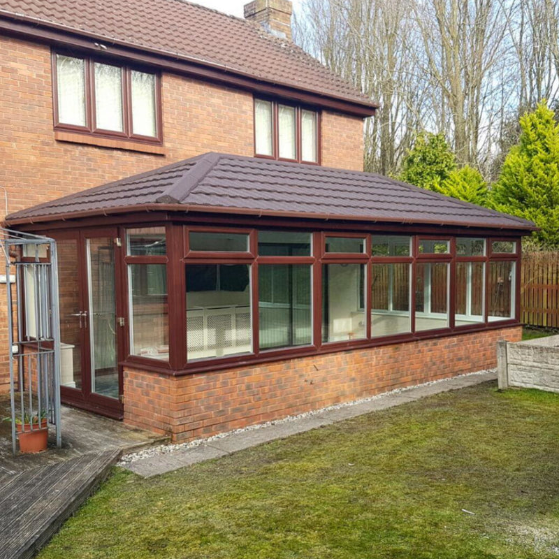 An image of a conservatory with Britmet Profile 49 Roof Shingles  