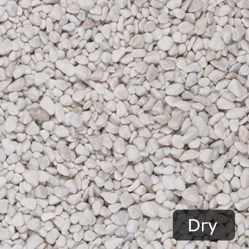 An image showing Artico White Marble Stone Aggregate Chippings when Dry