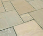 An image of Autumn Brown Indian Sandstone Paving laid out to show how it looks.