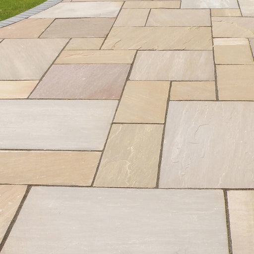 An image of Autumn Brown Indian Sandstone Paving laid out to show how it looks.