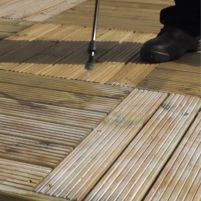 An image of Azpects EASYSeal Decl Protect being sprayed onto some decking.