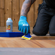 An image of Azpects EASYSeal Natural Stone Intensifier being applied with a sponge applicator.