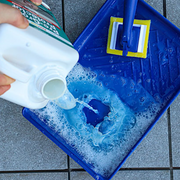 An image of Azpects EASYSeal Pre Grout Protector being poured into a tray ready to be used.