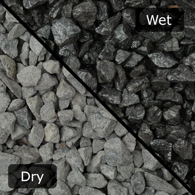 An image of Black Basalt Chippings when it is wet