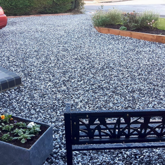 An image of Black Ice Stone Chippings laid on a driveway