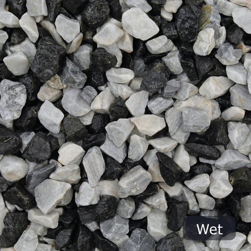 An image of Black Ice Stone Chippings when they are wet