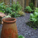 An image of Blue Slate Chippings when laid as a garden path