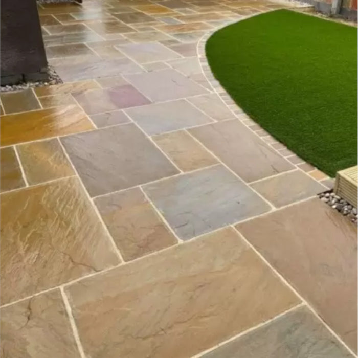 Image of Bond-it Indian Stone Sealer applied to Indian sandstone paving to show the effect.