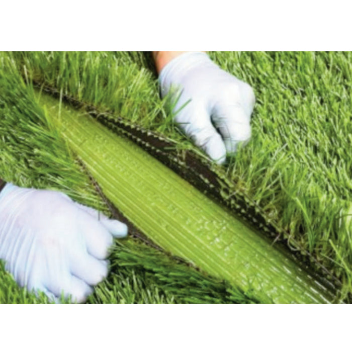 An image of the astro pro seeming / joining tape laid on the ground with adhesive applied ready to join two parts of artificial turf