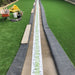 An image of the astro pro seeming / joining tape laid on the ground with adhesive applied ready to join two parts of artificial turf