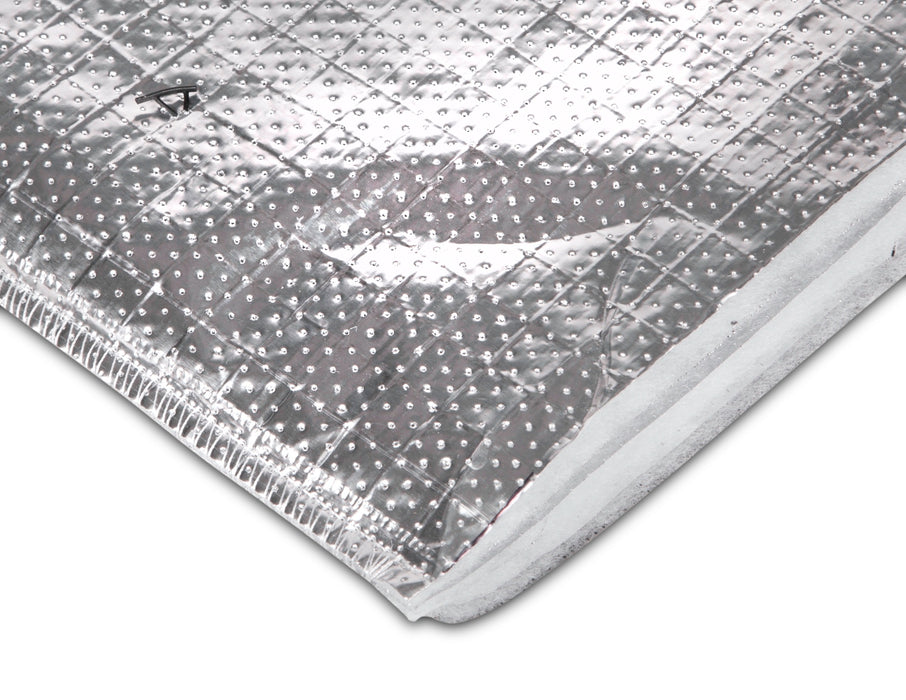 A close up image of a cross section of YBS BreatherQuilt insulation against a white background to show the layers in the foil insulation.