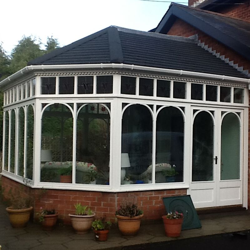 An image showing a conservatory roof with Britmet Plaintile Lightweight Roof Shingles
