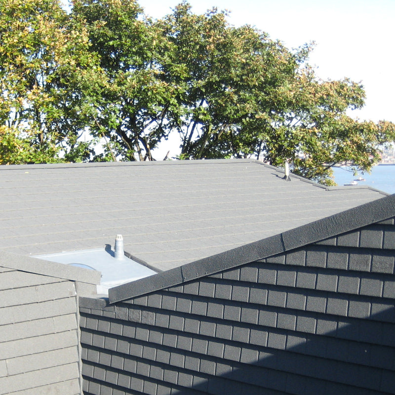 An image of a roof showing a Britmet Plaintile Roof with Verge Barge installed 