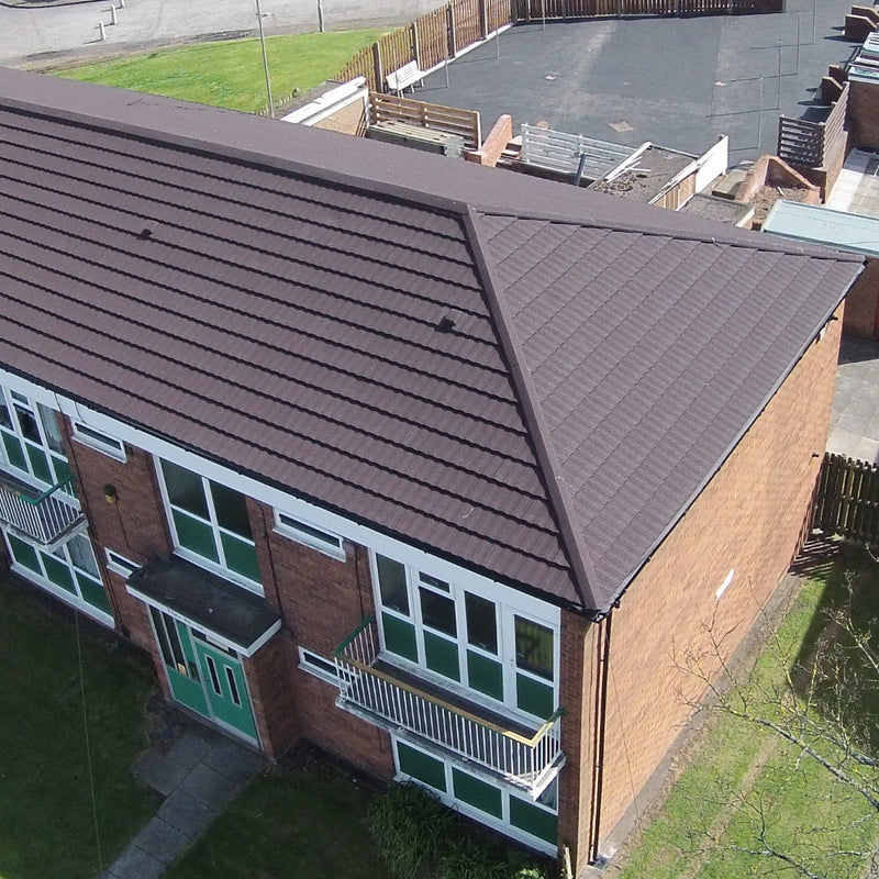 An image showing a roof fitted with Britmet Ultratile Shingles
