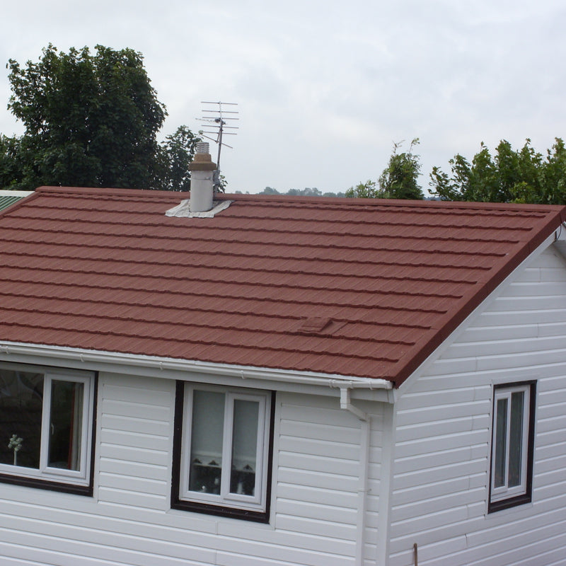 An image showing a roof fitting with Britmet Ultratile Roof Tiles with a tile Vent installed 