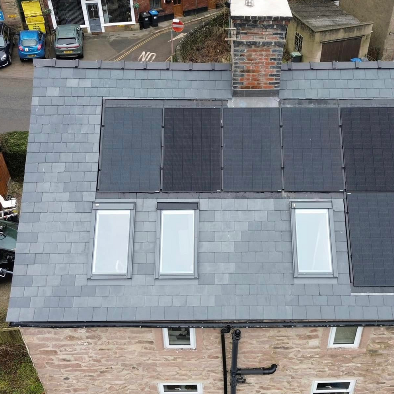 Roof with solar panels and windows with Chinese slate.