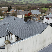 An image of a row of houses with the roofs fitted with Chinese roof slate