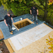 An image of some EPDM rubber roofing on a roof using ClassicBond WBA Roof Deck Adhesive to secure the rubber sheet to the roof.