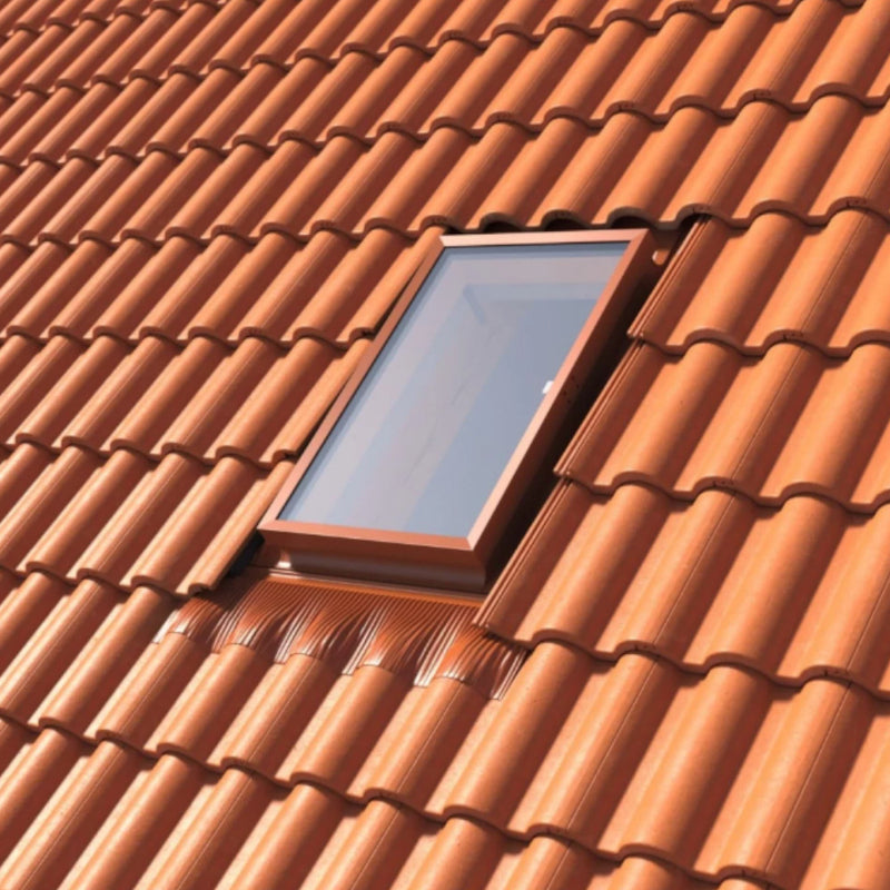An image showing a Dakea Control Skylight KFE in Red from the outside on a roof.
