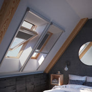 A image showing a Dakea Insect Screen for Roof Windows ZIA installed on the inside of a window.