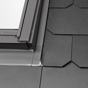 An image showing the Dakea Slate Flashing with One Piece Side Element KLS and what it llookslike installed onto a window.