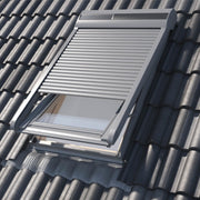 An image showing Dakea Solar Roller Shutters - SSR from the outside of a roof to show what they look like when partially opened on an open window