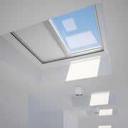 An image showing a Dakea Solar blind For Flat Roof Windows - FSA in white