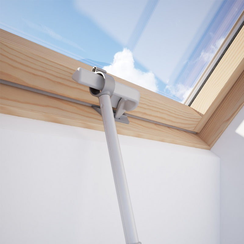 An image of a Dakea Telescopic Opening Rod ZCA being used to open a window to show how it can be used.