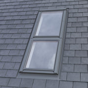 An image showing a Dakea Vision Energy Pitched Roofing Window KAI B1600 in a Pine interior finish. The image shows what it looks like from the outside on a roof.