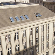 An image showing a Dakea Ultima Comfort Centre Pivot Roof Window fitted to the top of a very large building to show the versitility.