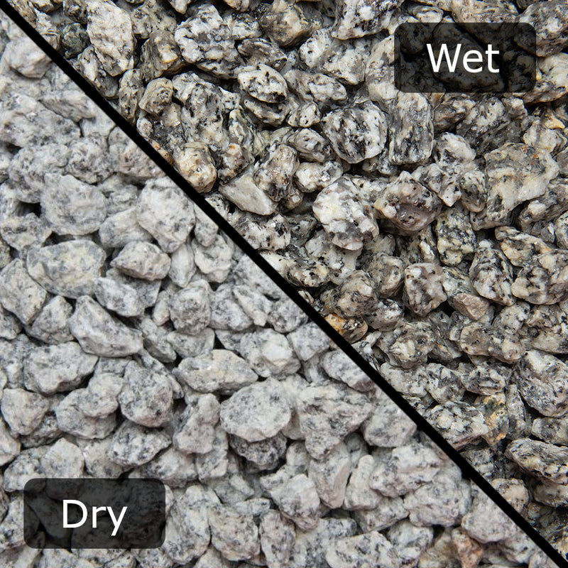 An image showing Dapple Grey Granite Stone Aggregate Chippings. The image is split horizontally to sow the difference between wet and dry.