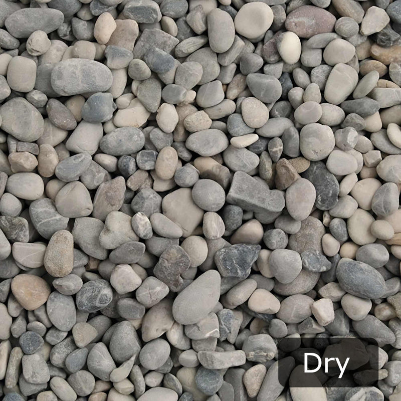 An image showing Dove Grey Pebble Stone Aggregate Gravel when they are dry.