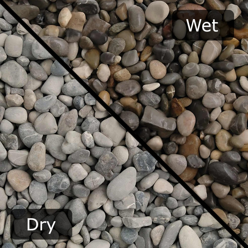 An image showing Dove Grey Pebble Stone Aggregate Gravel. The image is split horizontally to sow the difference between wet and dry.