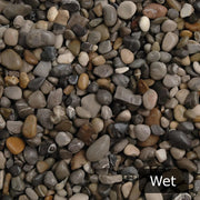 An image showing Dove Grey Pebble Stone Aggregate Gravel when they are wet.