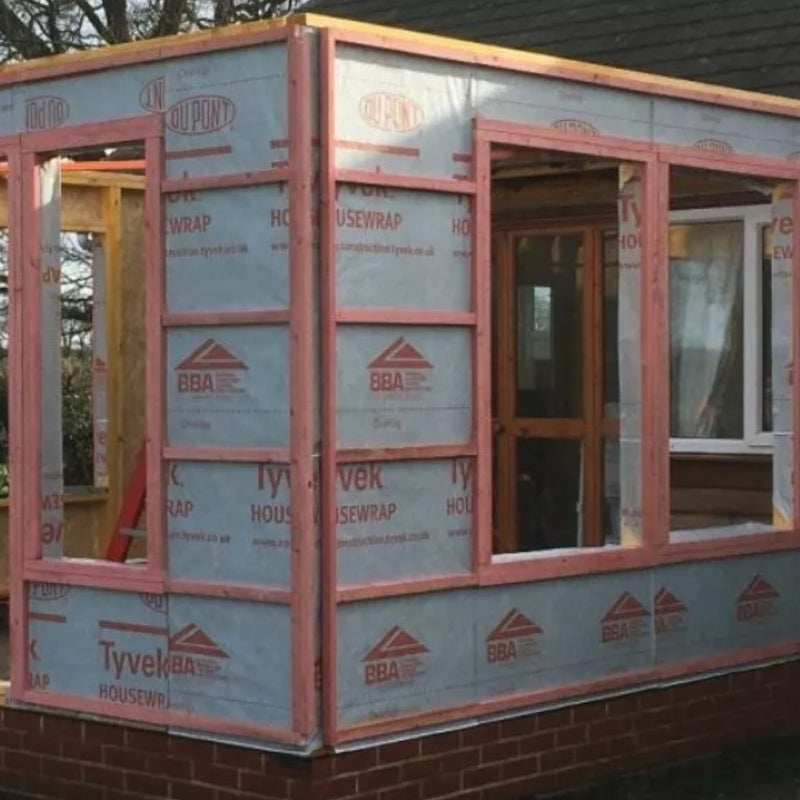 An image showing Dupont Timber Frame Membrane Tyvek Housewrap Breather Membrane on a building.