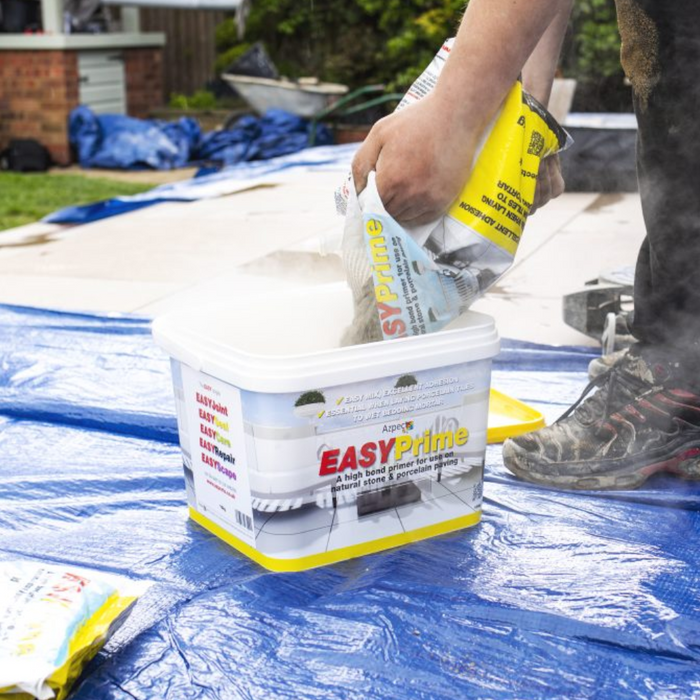 An image of EASYPrime Priming Slurry being poured back into the tub it is supplied in