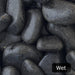An image showing Ebony Cobble Stone Aggregate Gravel when they are wet.