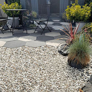 An image showing Enviro Stone Aggregate Chippings when laid as part of a garden walk way.