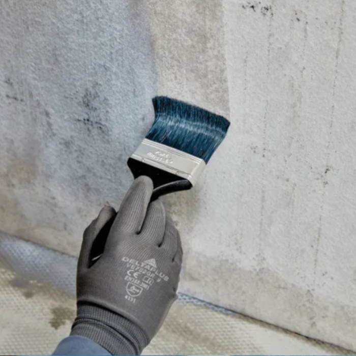 An image showing the application of Aquaseal Waterproof Tanking Primer.