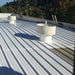 An image of a roof painted with Black Jack Solar Reflective Paint 907 to sow the finish.