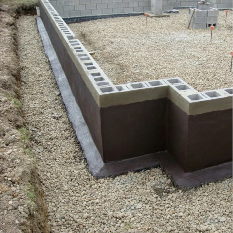 An image of Black Jack DPM 908  applied to a wall sitting on a houses foundations.