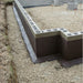 An image of Black Jack DPM 908  applied to a wall sitting on a houses foundations.