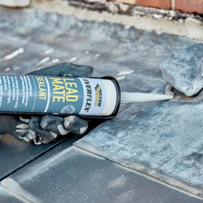 An image of Everbuild Lead mate sealant being applied between two sheets of lead flashing.